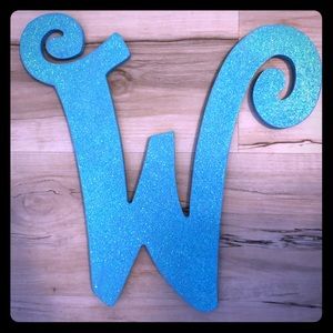 Aqua “W” sign